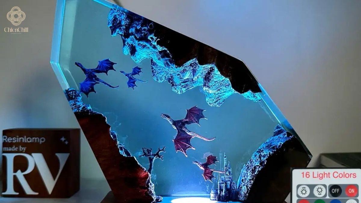 A handcrafted resin lamp showcasing a glowing fantasy scene, adding depth, mood, and artistic character to modern living spaces.