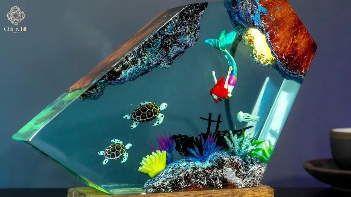 Handmade ocean resin night light with mermaid, sea turtles, and coral reef on a wooden base.